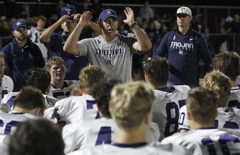 Cary-Grove Head Coach Brad Seaburg talks to his team after a 18-12 win over Prairie Ridge in a Fox Valley Conference football game on Friday, Sept. 27, 2024, at Prairie Ridge High School.