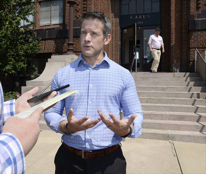 U.S. Rep. Adam Kinzinger (R-Channahon) talks Thursday, Aug. 5, 2021, in front of Carus Corporation in Peru