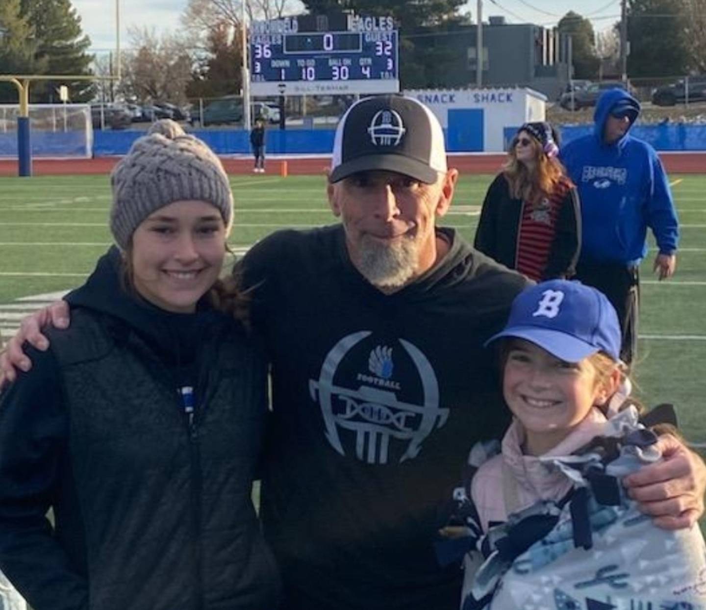 Blair Hubbard and his daughters, Anna (left) and Emma.