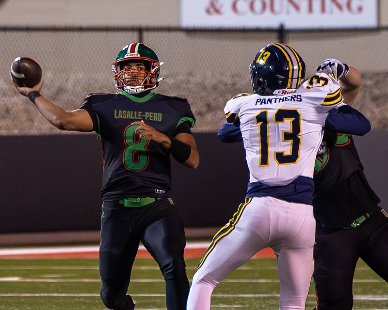 Marion Persich (8) of L-P throws ball to receiver on Friday, October 24, 2025 at Howard Fellows Stadium in LaSalle.