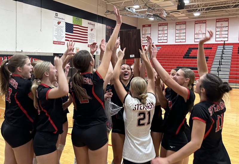 The Steamers volleyball team celebnrate after winning the Stillman Valley Tournament on Saturday, Oct. 25, 2025 at Stillman Valley High School.