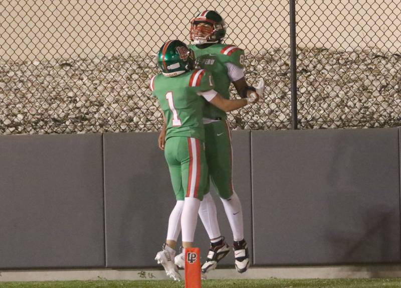 L-P quarterback Marion Persich celebrates with teammate Rafe Helmig after scoring a touchdown on Friday, Sept. 5, 2025 at Howard Fellows Stadium.