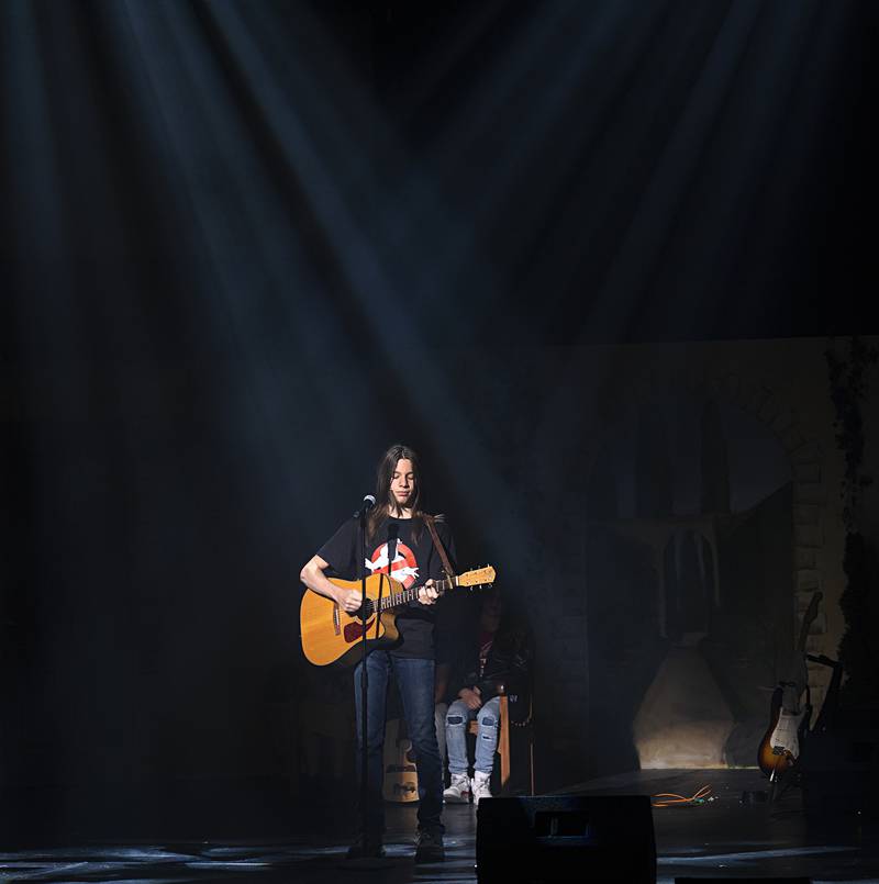 Silas Graff performs “Psycho Killer” on Sunday, June 2, 2024, at The Dixon. The Dixon Young Actors performed “Taming of the Shrew: 80s Style” with an updated 1980s flair over the weekend.