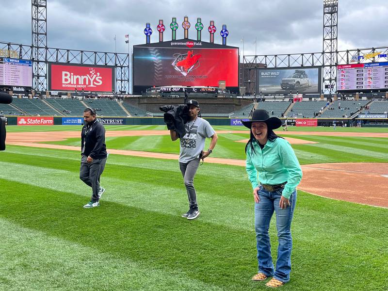 Ashley Burke of Morris delivers the game ball during the first game of the Chicago White Sox double header on Wednesday, April 17.