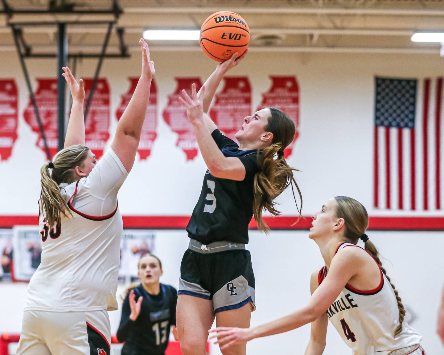 Oswego East's Maggie Lewandowski (3) puts up shot during their basketball game between Oswego East at Yorkville, Thursday  Dec 12, 2024 in Yorkville.