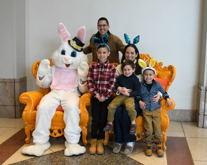Cruz Ruiz-Saucedo, 9, Joe Saucedo, Cat Ruiz, Diego Ruiz-Saucedo, 2, and Esai Ruiz-Saucedo, 5, of Skokie pose with the Easter bunny during the Easter Egg Hunt event held at Cantigny Park in Wheaton on Sunday March 24, 2024.