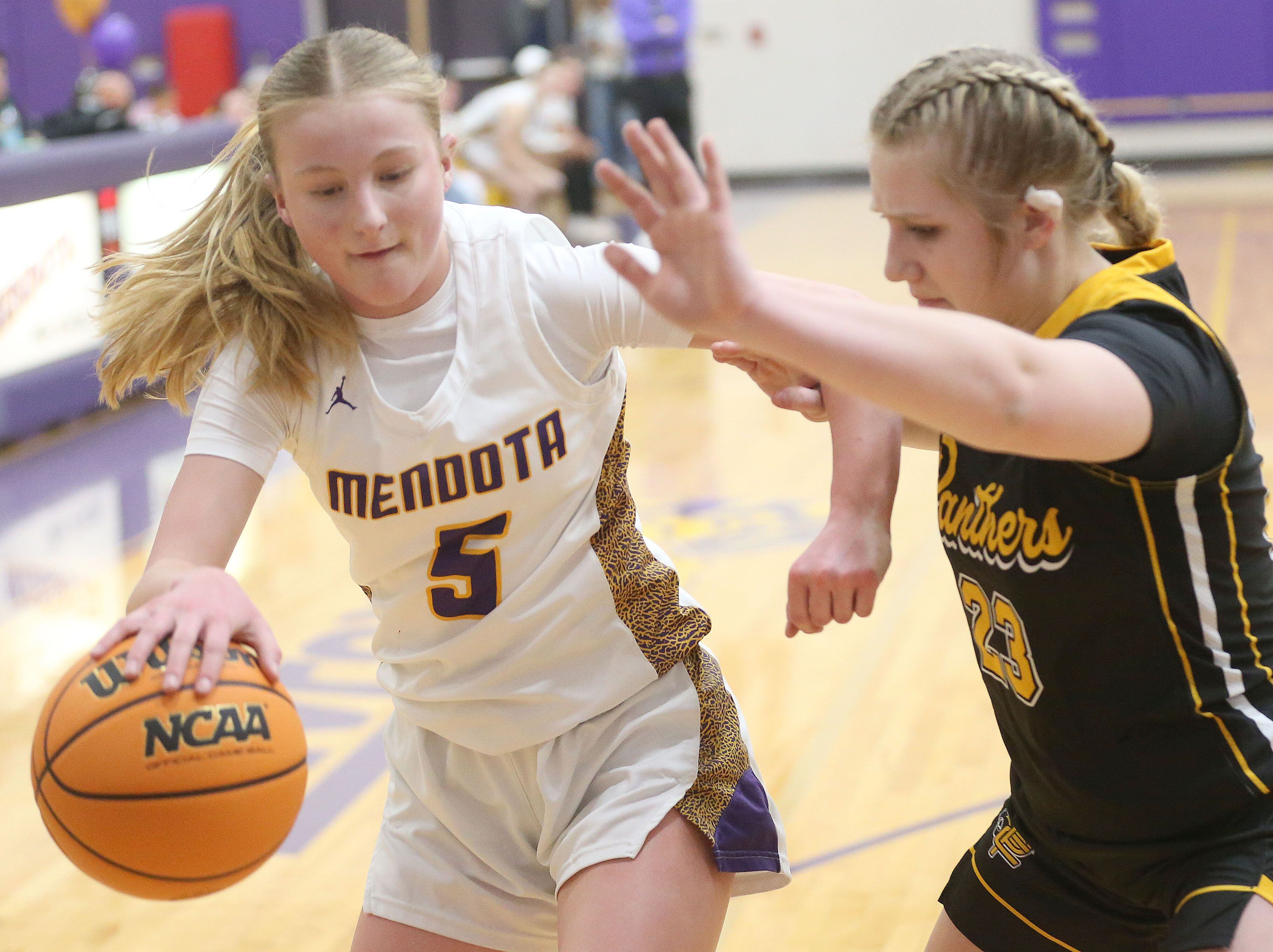 Mendota's Eva Beetz dribbles alongside Putnam County's Emberlyn Cwikla on Tuesday, Feb. 10, 2026 at Mendota High School.