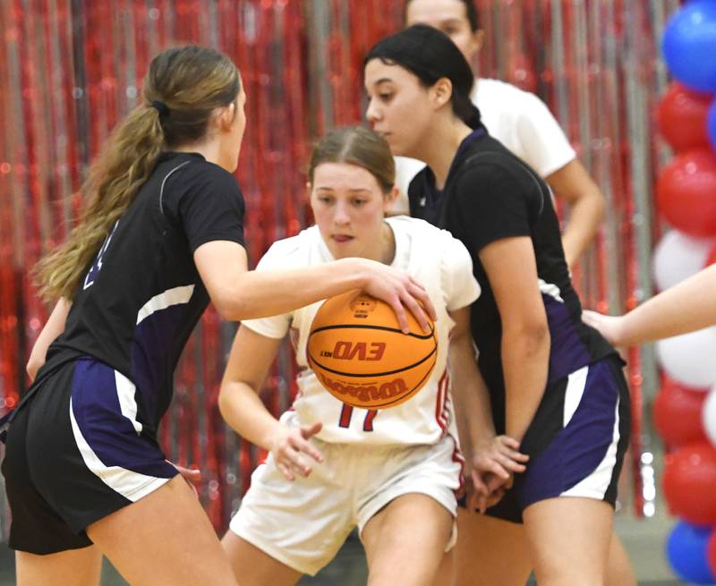 Oregon's Addison Rufer fights her way through a screen during a Saturday, Jan. 24, 2026 game with Rockford Lutheran at the Blackhawk Center in Oregon.