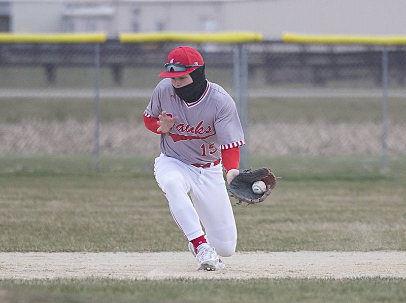 Oregon’s Jack Washburn scoops the ball at shortstop against Amboy Thursday, March 21, 2024 in Oregon.