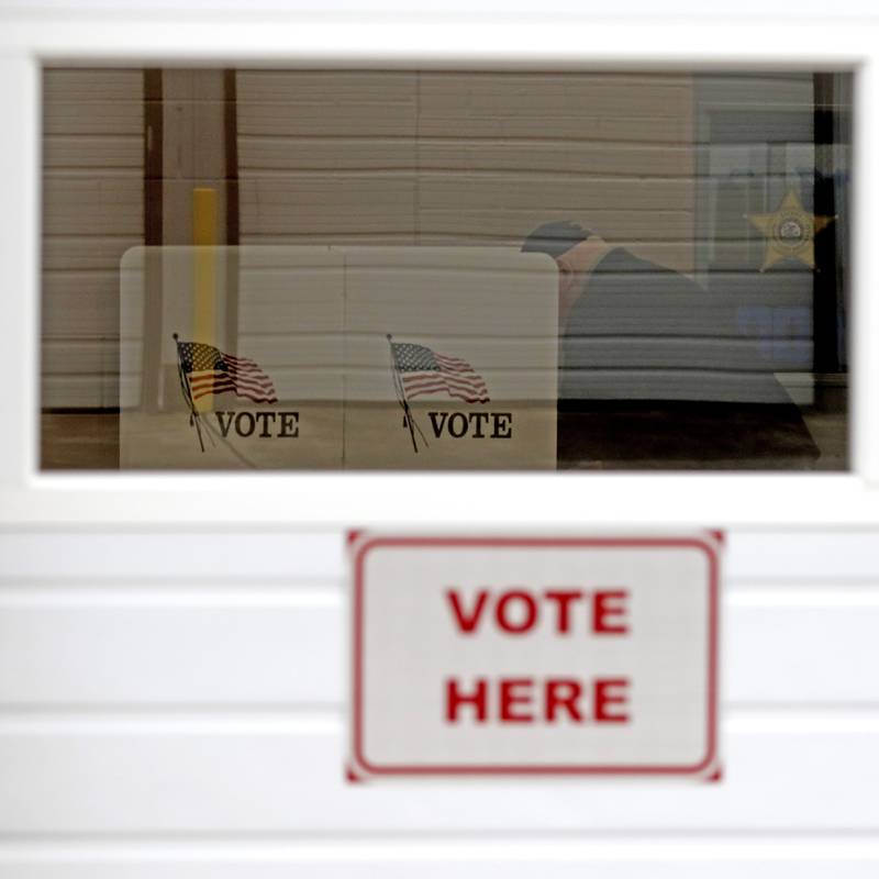 A man votes at the Algonquin Township Building in Cary on Thursday, March 14, 2024.