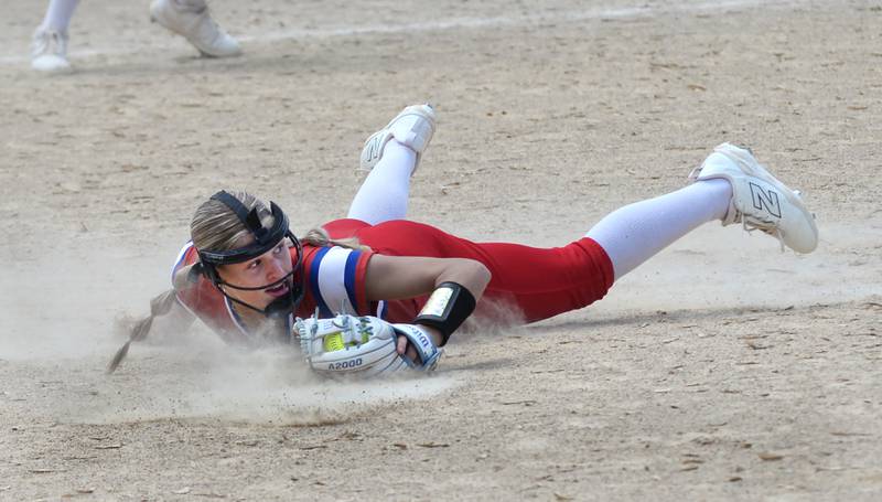 Morrison's Bella Duncan looks the runner back at second after diving and catching a bunt for an out against Oregon on Saturday, May 17, 2025 at Oregon Park West. The Fillies won the game 5-0 with Duncan shutting out the Hawks and hitting a double and home run.
