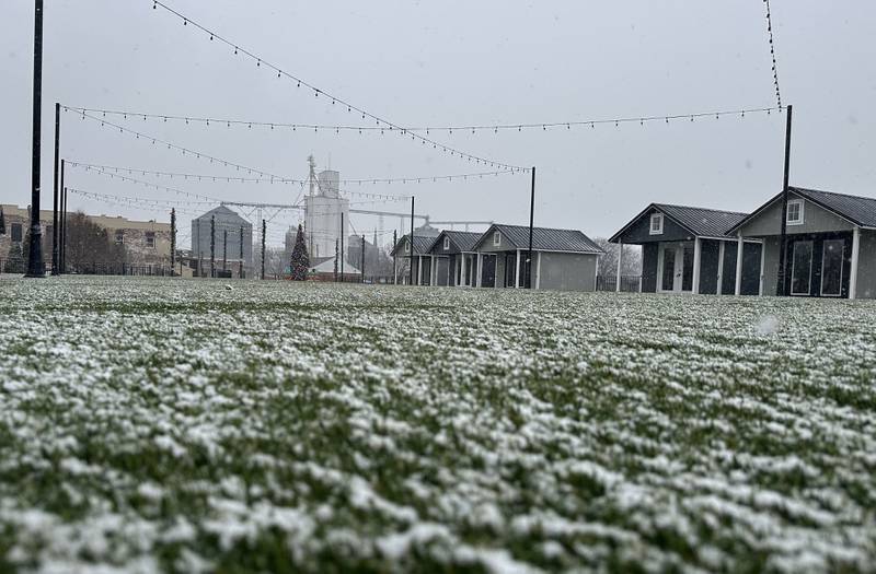 Snow sticks to the turf at the Market on Mill site on Thursday, Jan. 2, 2025 in Utica.