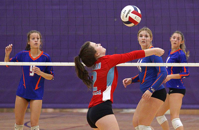 Marian Central’s Jilly Winkelman passes the ball against Genoa-Kingston in varsity volleyball tournament action on Saturday, Sept. 21, 2024, at Hampshire High School in Hampshire.