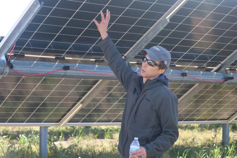 Brad Koeppke leads a tour Oct. 10, 2023 of one of the two community solar projects in DeKalb.