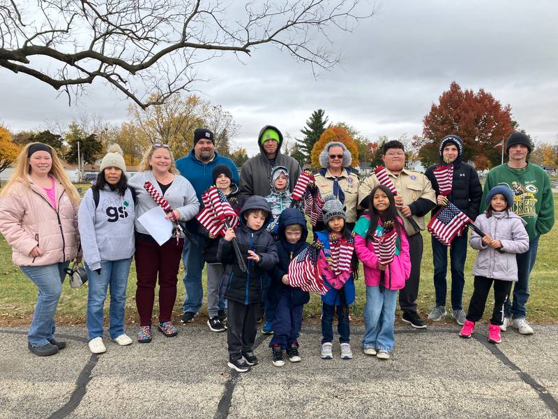 The Rochelle Chapter Daughters of the American Revolution, with the assistance of the Rochelle area Scout Troops 409, 1168 and 553, placed flags on veterans' graves at St. Patrick's and Lawnridge Cemeteries for Veterans Day and in preparation for Wreaths across America. Wreaths may be sponsored up until the deadline of November 28 for placement this December. Forms are available at St. Patrick's Church, the Rochelle VFW and online at https://wreathsacrossamerica.org/IL0136P .