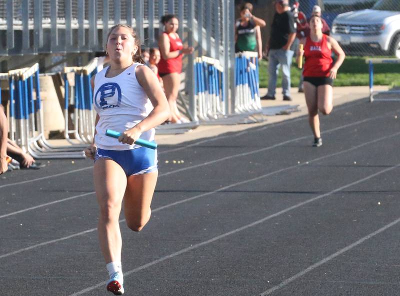 Princeton's Miyah Fox competes in the 4x100 relay during the Ferris Invitational on Monday, April 15, 2024 at Princeton High School.