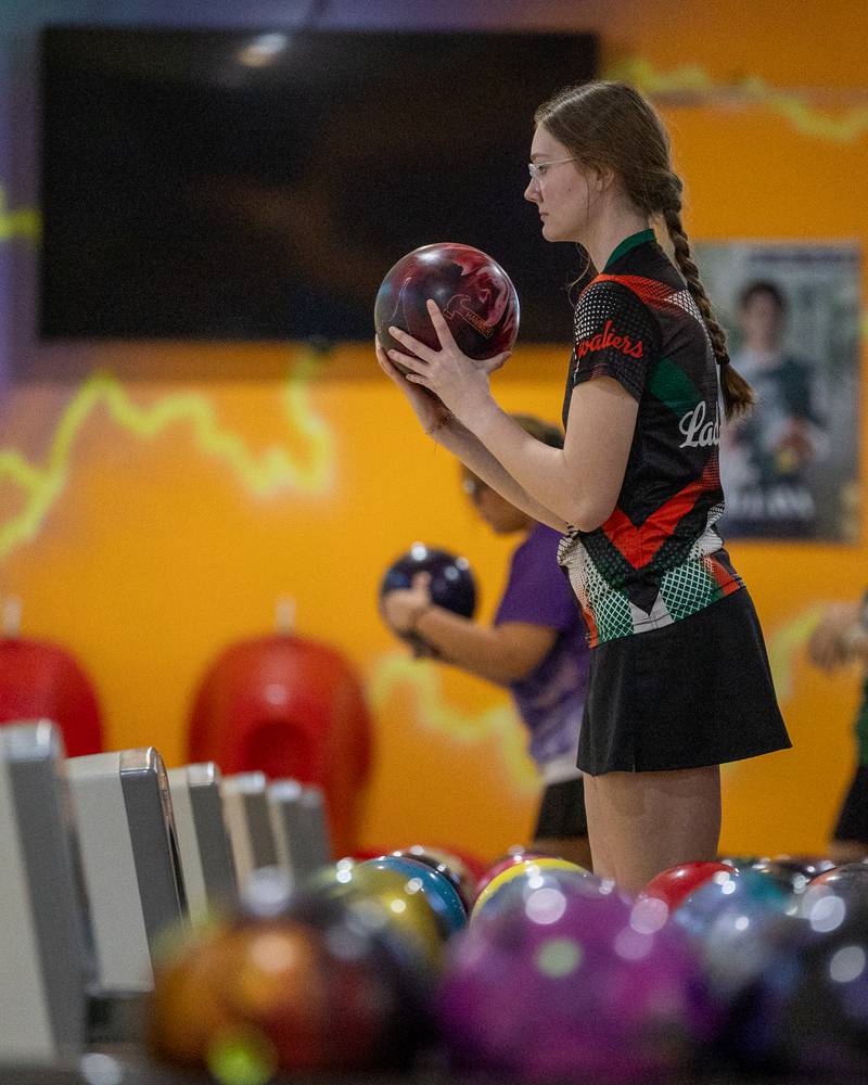 Leah Ricci of LaSalle-Peru looks down lane before bowling ball during the L-P Cavalier Classic on Saturday, December 20, 2025 at Super Bowl in Peru.