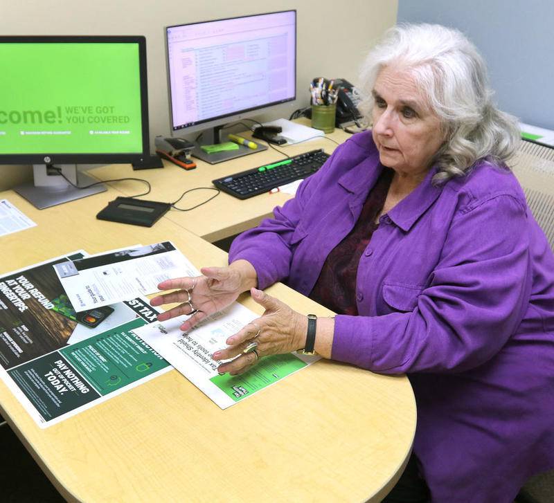 Carme Gregory, a senior tax analyst at H&R Block, talks about some of the changes in this year's tax code Friday at H&R Block in Sycamore.