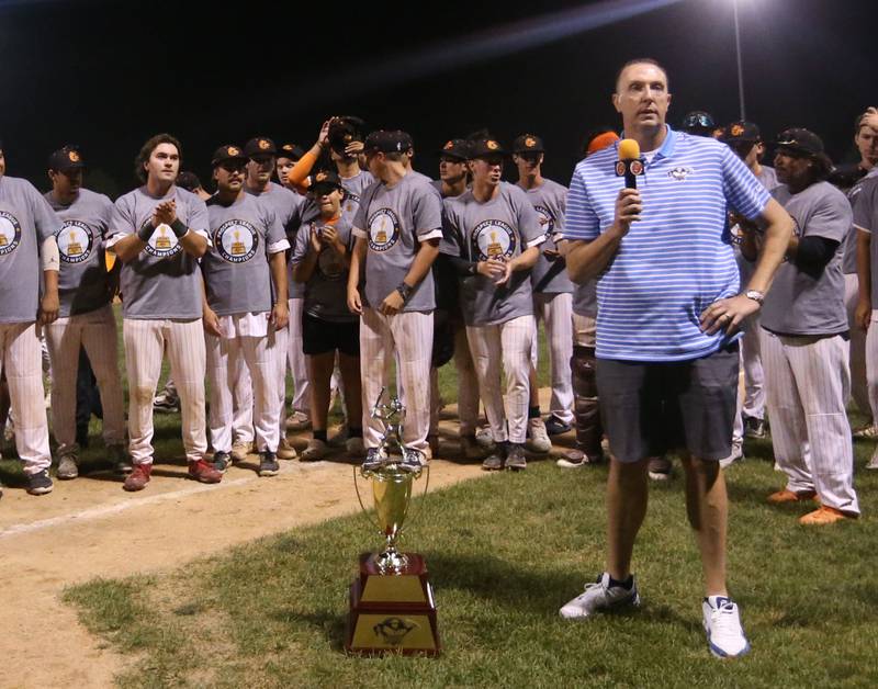 David Brauer commissioner of the Prospect League presents the Prospect League trophy to the Illinois Valley Pistol Shrimp on Wednesday, Aug. 7, 2024 at Schweickert Stadium in Peru.