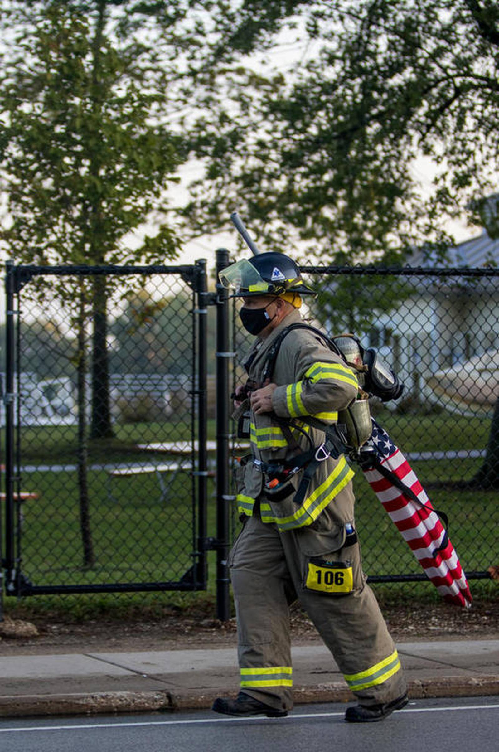 Crystal Lake firefighter runs half marathon in full gear, tank and all