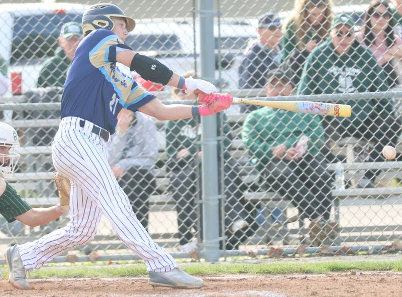 Marquette's Easton Debernardi makes contact with the ball on Tuesday, April 28, 2026 at Masinelli Field in Ottawa.