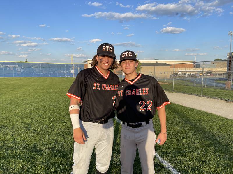 St. Charles East’s Jake Zitella (left) and Jake Liska following their 10-3 victory over Wheaton North on Monday.