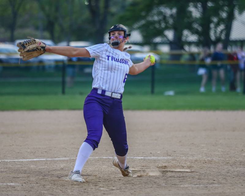 Downers Grove North's Ava Gusel (6) delivers a pitch during varsity softball game between Downers Grove South at Downers Grove North.  May 11, 2023.