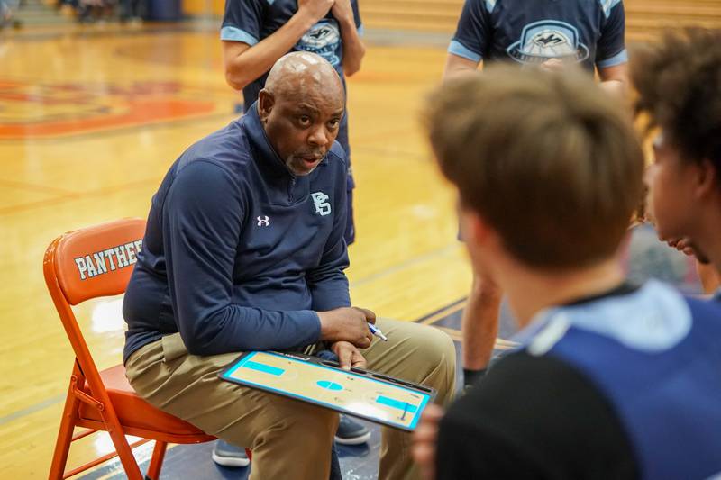 Plainfield South's head coach Jeff Howard talks to his players during a basketball game against Oswego at Oswego High School on Friday, January 17, 2025.