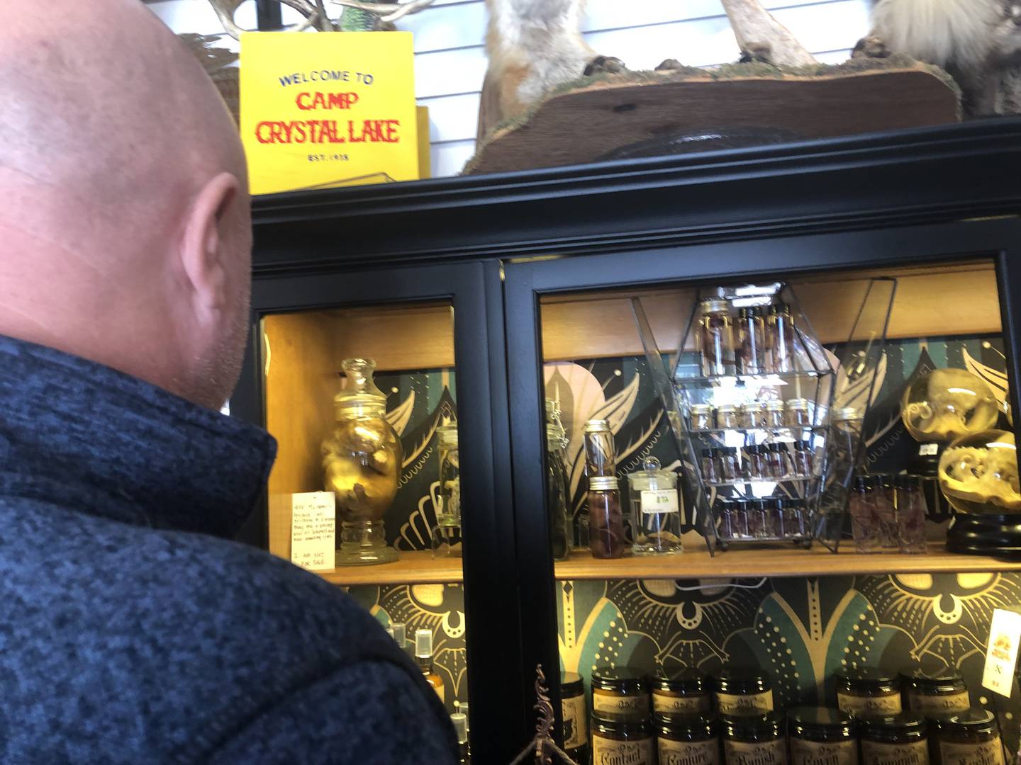Don Schlicker looks at items at Preserved Peculiarities Oct. 26, 2024 in McHenry.