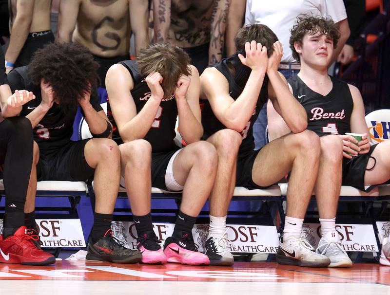 Benet players can’t watch as time ticks away Saturday, March 14, 2026, in their IHSA Class 4A state championship loss to Marist in the State Farm Center at the University of Illinois in Champaign.