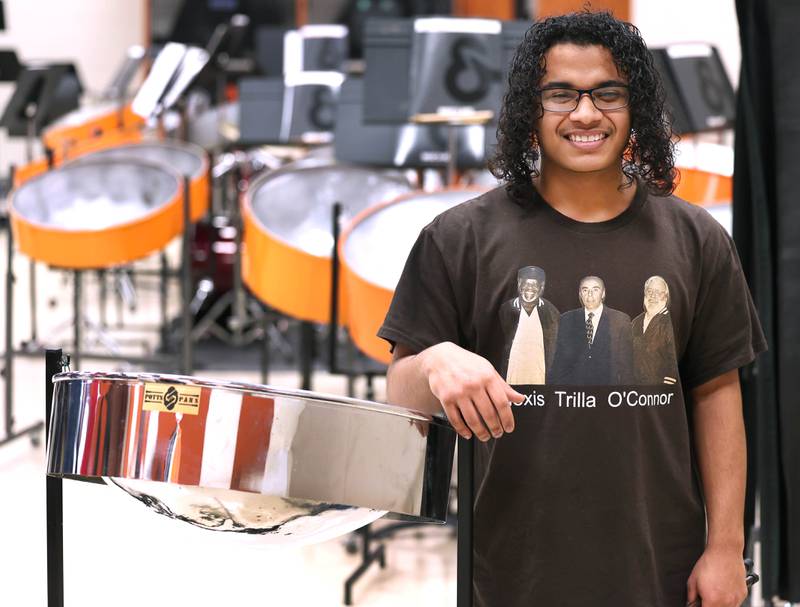 Jaden Teague-Núñez, 16, a sophomore at DeKalb High School, with a steelpan Monday, March 18, 2024, in the band room at the school. Teague-Núñez won first place in the Chicago Symphony Orchestra’s Young Artists Competition and will appear as a soloist in a CSO youth concert during the 2024-25 season.