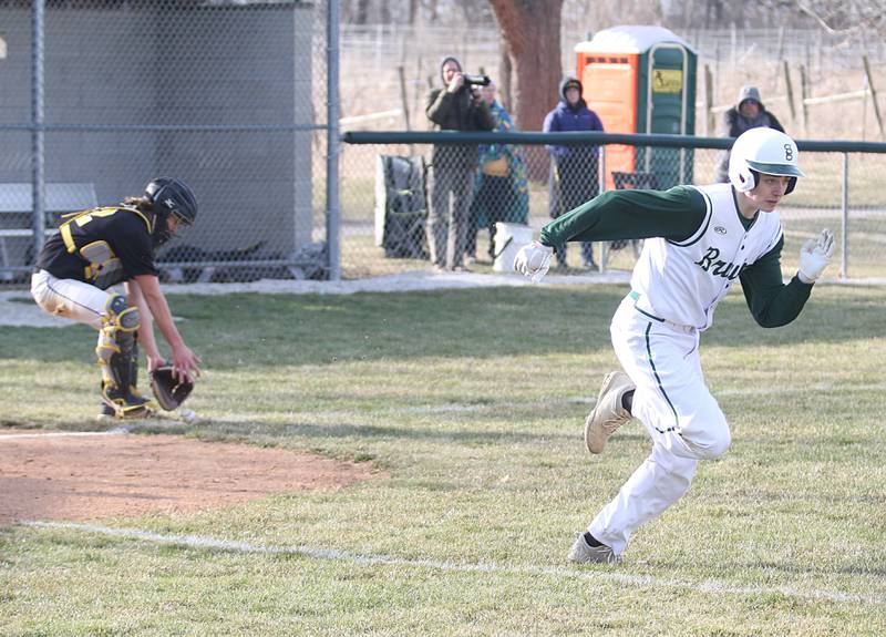 St. Bede's Alex Ankiewicz sprints down to first base as Riverdale's catcher Braxton Hager picks up the ball on Monday, March 20, 2023 at St. Bede Academy.