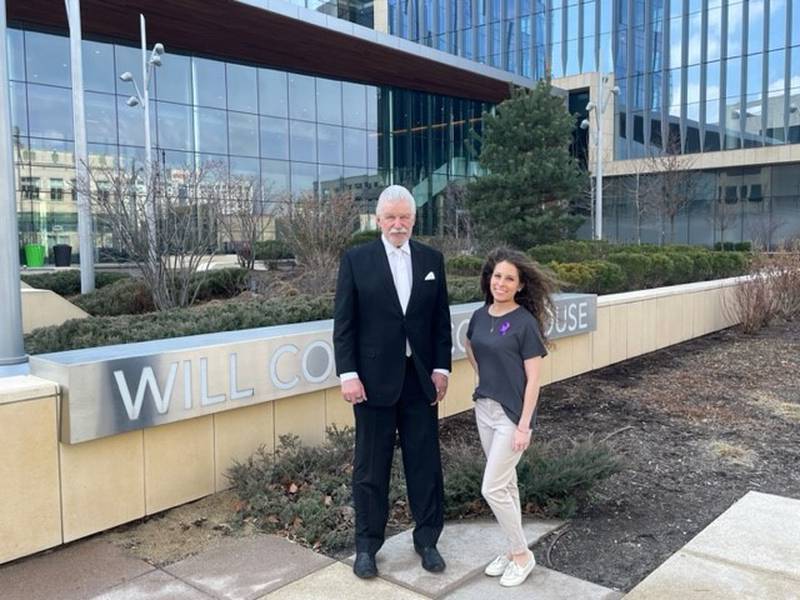 Will County State's Attorney James Glasgow and 12th Judicial Family Violence Coordinating Council Coordinator Amirrah Abou-Youssef.