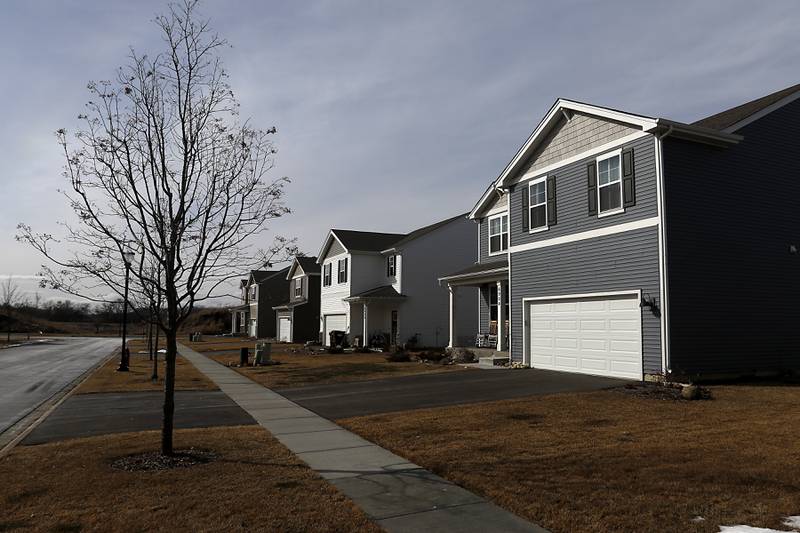 New single-family homes in the Stonewater subdivision in Wonder Lake on Friday, Feb. 24, 2023. When the subdivision is finished, 3,400 to 3,700 more rooftops will be added to Wonder Lake, potentially making the village one of the larger municipalities in McHenry County.