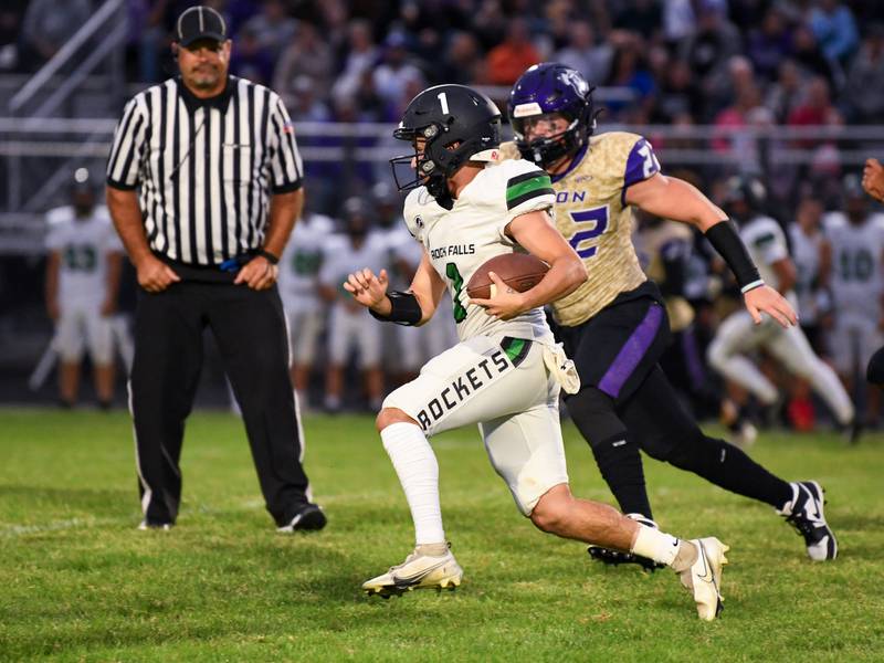 Rock Falls quarterback Easton Canales runs through Dixon's defense in Rock Falls on Friday, Sept. 8, 2023.
