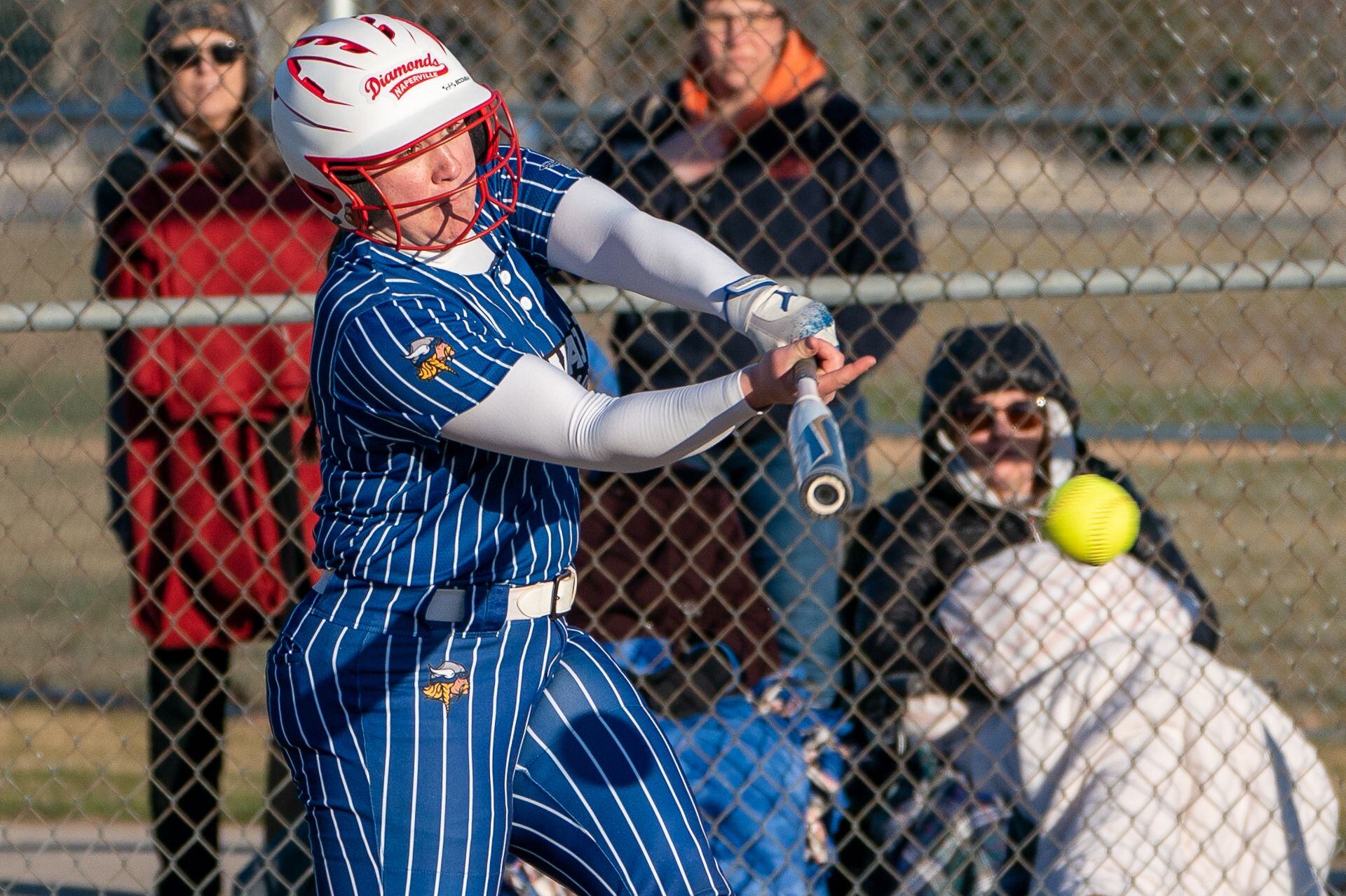 Newark’s Danica Peshia (17) singles against Batavia during a softball game at Batavia High School.