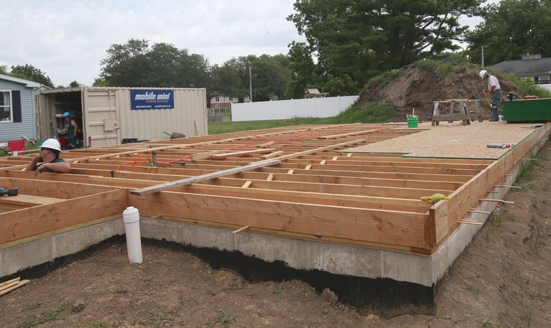 Crews begin to build the structure of a new Habitat for Humanity home on Thursday, July 10, 2025 in Princeton. The home is located near the intersection of Cherry and Marquette Street in Princeton. A family of 6, including 4 young children, will move into the home. Volunteers interested in helping with the home are asked to contact to Habitat for Humanity La Salle, Bureau, Putnam Counties by contacting the Peru office. The home should be completed by the end of the year.