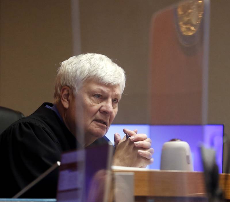 Judge Robert Wilbrandt asked William P. Linke questions during his hearing Thursday, April 14, 2022, in the McHenry County Michael J. Sullivan Judicial Center. Linke was one of three people charged in the March 2020 murder of Robert Krikie Jr., a homeless man whose body was found floating in the water at Three Oaks Recreation Area in Crystal Lake.