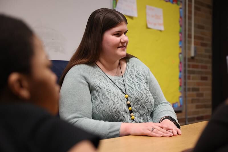 French EL teacher Kira Cloonan works with a group of 4th graders Djonga Kameni at Carl Sandburg Elementary in Joliet.