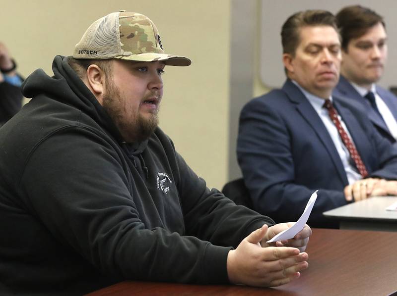 Tyler Duncan, the director of marketing and public relations at Second Amendment Sports, in McHenry, addresses McHenry County's Law and Government Committee on Tuesday, Jan. 31, 2023, at the McHenry County Administration Building. The committee held a public comment period before it considered a resolution to oppose Illinois' newest gun ban and support its repeal.