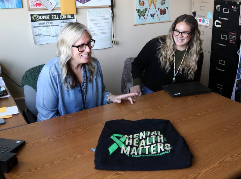 Maryellen Spicer (left) and Mallory Wolf, social workers at Sycamore High School, talk Wednesday, April 16, 2025, at the school about the Student-Athlete Support Coalition that they are a part of that gives support to student athletes at the school.