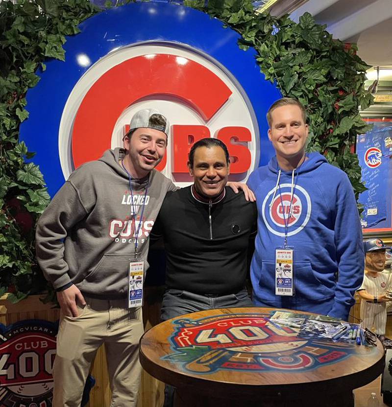 "Locked On Cubs" podcast hosts Sam Olbur (left) and Matt Cozzi flank former Cubs slugger Sammy Sosa at a Club 400 event in September 2024 in Lake in the Hills.