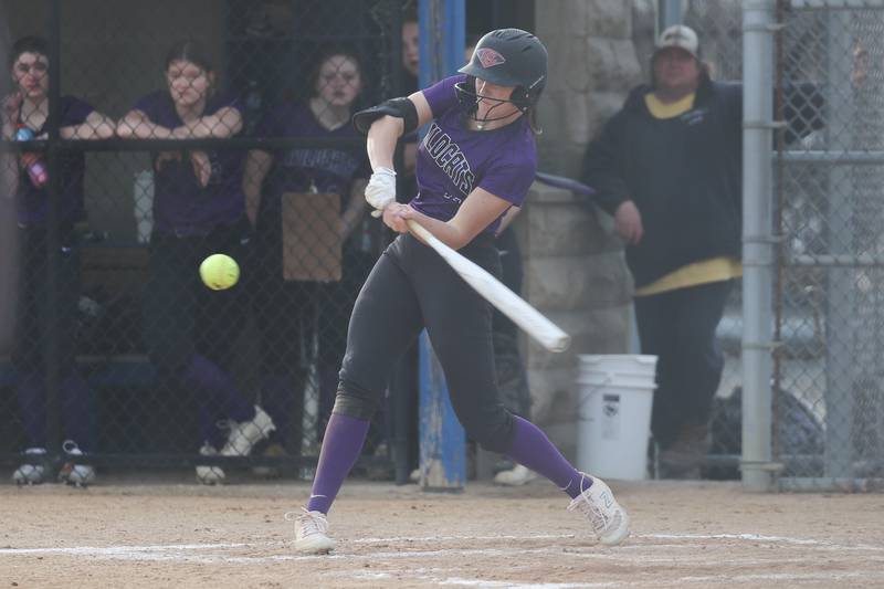 Wilmington’s Molly Southall drives in a run against Joliet Central on Tuesday, March 12 in Joliet.