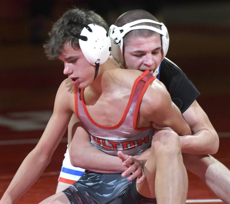 Oregon's Jordan Lowe and Fulton's Hudson Price wrestle at 113-pounds at Oregon High School on Thursday, Dec. 4, 2025.