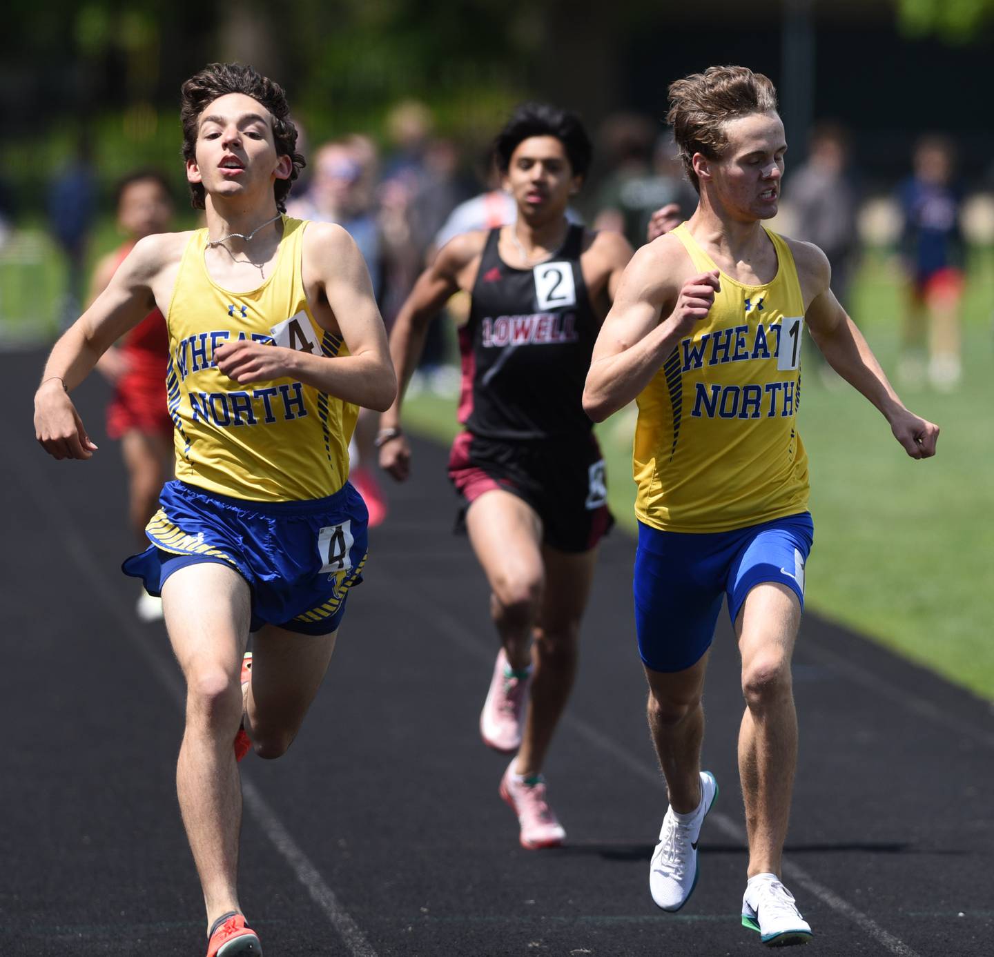 Wheaton North’s Levi Turner, left, finished just ahead of teammate Aidan Murphy in the 800-meter run during the Glenbard West boys track and field invite on Saturday, May 3, 2025 in Glen Ellyn.