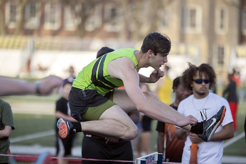 Rock Falls’ Richard Nichols clears a hurdle in the 110 boys shuttle hurdle relays Thursday, April 27, 2023  at the Sterling Night Relays.