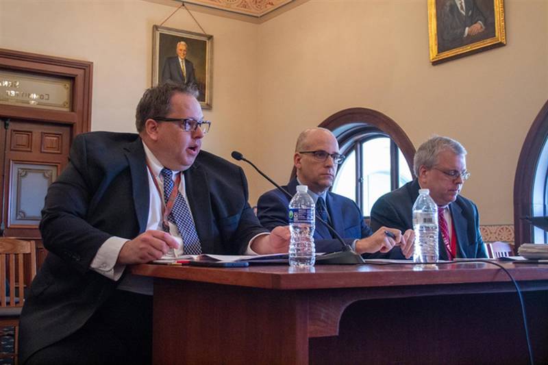 Commission on Government Forecasting and Accountability chief economist Ben Varner (left to right), revenue manager Eric Noggle and executive director Clayton Klenke testify at the commission’s annual revenue update meeting in Springfield Tuesday.