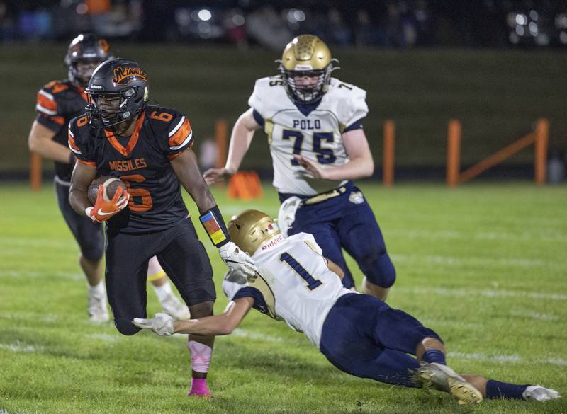 Milledgeville’s Micah Toms-Smith picks up yards against Polo Friday, Oct. 4, 2024, at Milledgeville High School.