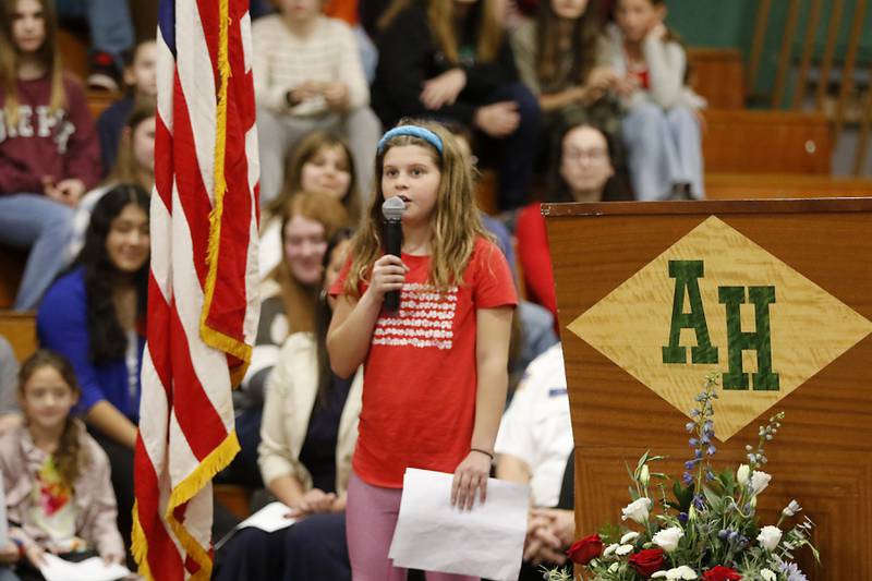 Tallulah Johnson, 10, thanks veterans during the Veterans Day ceremony Wednesday, Nov.8, 2023, at Alden-Hebron High School in Hebron.