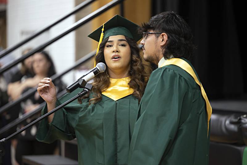 Ariana Diaz and Raul Fernandez sing the national anthem during Rock Falls high’s graduation ceremony Sunday, May 28, 2023.